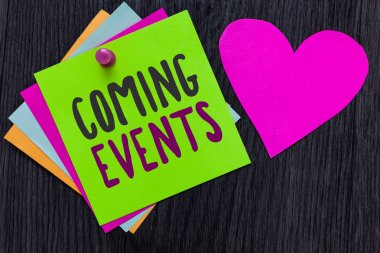 Text sign showing Coming Events. Conceptual photo Happening soon Forthcoming Planned meet Upcoming In the Future Papers Romantic lovely message Heart Good feelings Wooden background. clipart