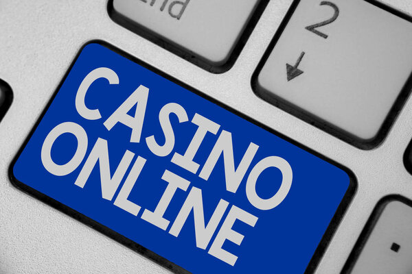 Writing note showing Casino Online. Business photo showcasing Computer Poker Game Gamble Royal Bet Lotto High Stakes Keyboard blue key Intention computer computing reflection document.