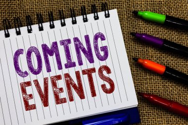 Metin işaret gösteren Coming Events. Yakında gelecek planlanan olay kavramsal fotoğraf karşılamak yaklaşan gelecekte açık spiral defter sayfası Jüt arka plan renkli işaretleri Expressing fikirler.