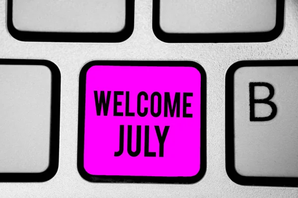 Conceptual hand writing showing Welcome July. Business photo text Calendar Seventh Month 31days Third Quarter New Season Keyboard purple key Intention create computer reflection document. — Stock Photo, Image