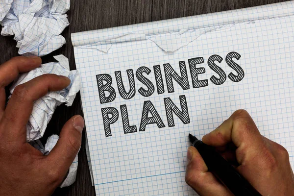 Word writing text Business Plan. Business concept for Structural Strategy Goals and Objectives Financial Projections Man holding marker notebook crumpled papers several tries mistakes made. — Stock Photo, Image