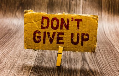 Conceptual hand writing showing Don t not Give Up. Business photo text Determined Persevering Continue to Believe in Yourself Paper notes reminders question mark asking important answer. clipart