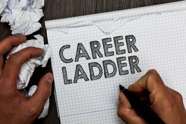 Word writing text Career Ladder. Business concept for Job Promotion Professional Progress Upward Mobility Achiever Man holding marker notebook crumpled papers several tries mistakes made.