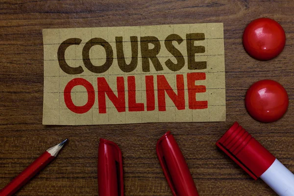 Handwriting text writing Course Online. Concept meaning eLearning Electronic Education Distant Study Digital Class Paperboard markers pencil wooden background communicating ideas red balls.