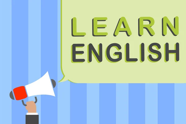 Writing note showing Learn English. Business photo showcasing Universal Language Easy Communication and Understand Man holding megaphone loudspeaker speech bubble message speaking loud