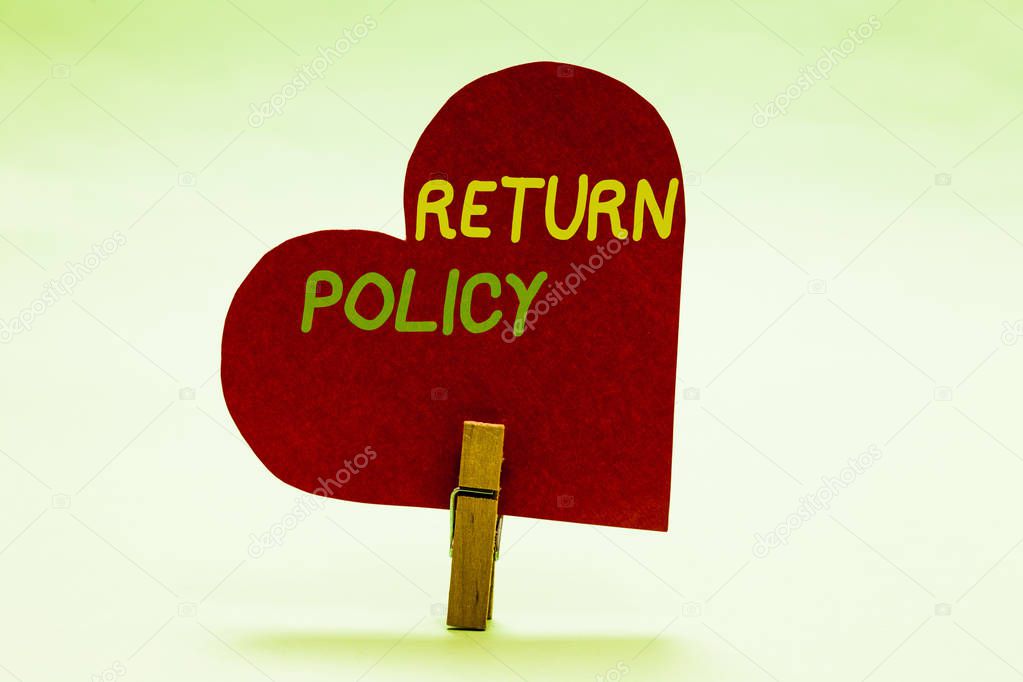 Writing note showing Return Policy. Business photo showcasing Tax Reimbursement Retail Terms and Conditions on Purchase Clothespin holding red paper heart important romantic message ideas.