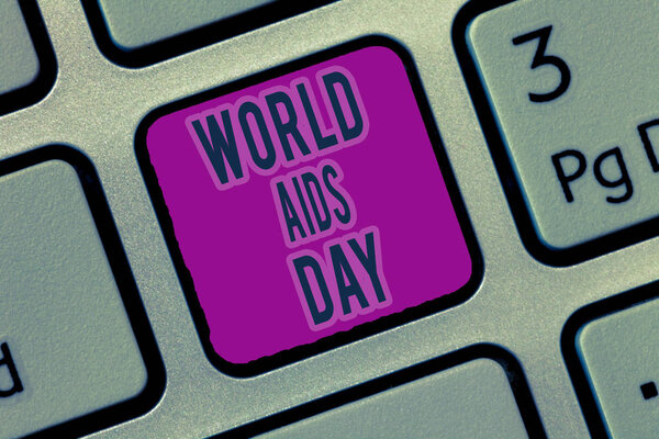 Writing note showing World Aids Day. Business photo showcasing 1st December dedicated to raising awareness of the AIDS