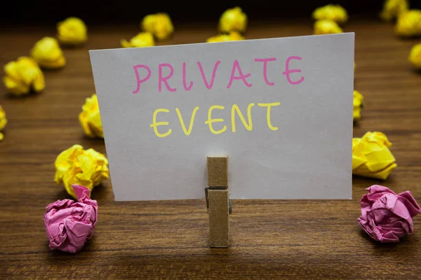 Handwriting text writing Private Event. Concept meaning Exclusive Reservations RSVP Invitational Seated Clothespin holding white paper note crumpled papers several tries mistakes. — Stock Photo, Image
