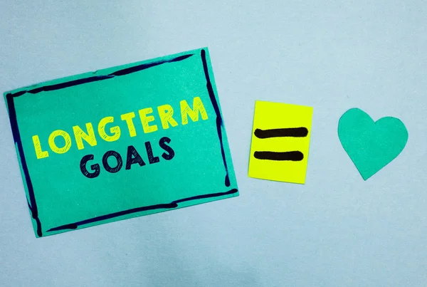 Handwriting text Longterm Goals. Concept meaning Strategic target that is required more time for completion Turquoise paper notes reminders equal sign important messages to remember. — Stock Photo, Image
