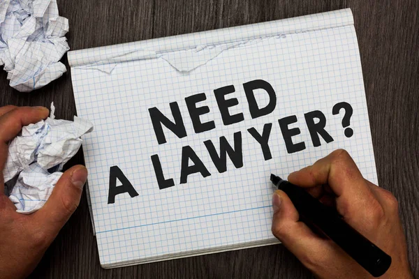 Writing note showing Need A Lawyer question. Business photo showcasing Legal problem Looking for help from an attorney Man holding marker notebook crumpled papers several tries made. — Stock Photo, Image