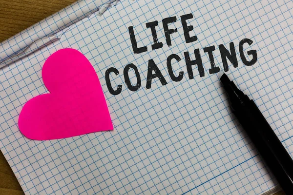 Text sign showing Life Coaching. Conceptual photo Improve Lives by Challenges Encourages us in our Careers Squared notebook paper ripped sheets Marker romantic ideas pink heart