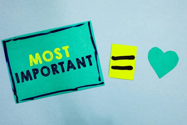 Handwriting text Most Important. Concept meaning Greatest or highest degree quantity or the like Significant Turquoise paper notes reminders equal sign important messages to remember. — Stock Photo, Image