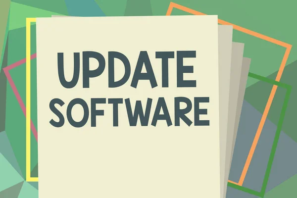 Writing note showing Update Software. Business photo showcasing replacing program with a newer version of same product