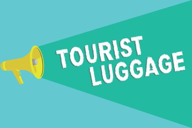 Turist Bagajı 'nı gösteren bir not yazıyorum. Seyahat için gereken her şeyi içeren büyük bir çanta.
