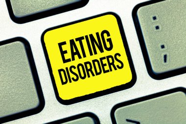 Yemek yeme bozukluklarını gösteren mesaj işareti. Kavramsal fotoğraf. Psikolojik anormal yemek alışkanlıkları..