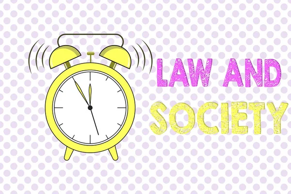 Word writing text Law And Society. Business concept for Address the mutual relationship between law and society