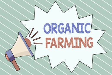 Organik Tarım 'ı gösteren bir not yazıyorum. Sürdürülebilirlik için çabalayan birleşik tarım sistemini gösteren iş fotoğrafı