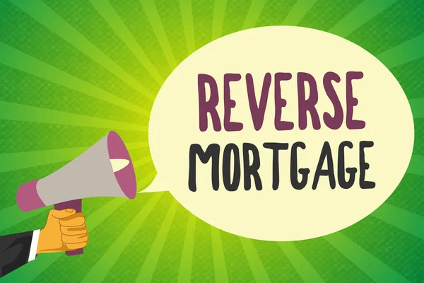 Handwriting text writing Reverse Mortgage. Concept meaning loan for seniors age above sixties and older to be returned