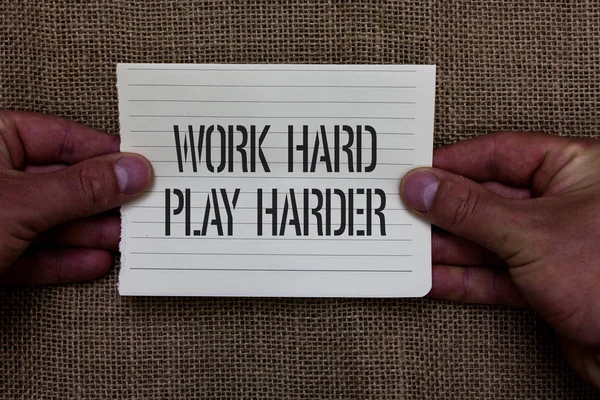 Text sign showing Work Hard Play Harder. Conceptual photo a Balance Life Have a Break Destressing to Relax Man holding piece notebook paper jute background Communicating ideas. — Stock Photo, Image