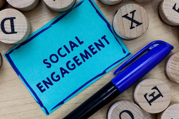 Conceptual hand writing showing Social Engagement. Business photo text Degree of engagement in an online community or society