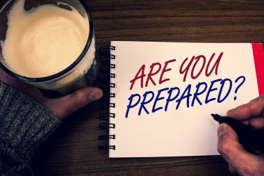 Word writing text Are You Prepared Question. Business concept for Ready Preparedness Readiness Assessment Evaluation Words notepad hands jumper holding open pen coffe glass desk sketch quick. clipart