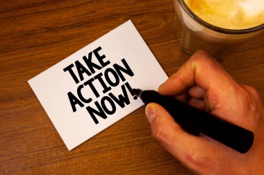 Conceptual hand writing showing Take Action Now Motivational Call. Business photo text Urgent Move Start Promptly Immediate Begin Text white paper hand black marker coffee glass letter. clipart