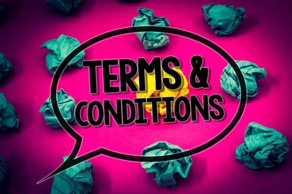 Handwriting text Terms  and Conditions. Concept meaning Legal Law Agreement Disclaimer Restrictions Settlement Huge emerald paper lobs surroundes yellow paper ball magenta color floor.