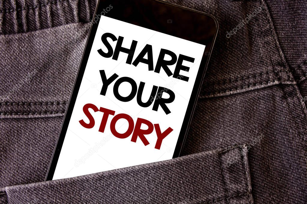 Writing note showing  Share Your Story. Business photo showcasing Experience Storytelling Nostalgia Thoughts Memory Personal Words written black Phone white Screen Back pocket grey jeans trousers.