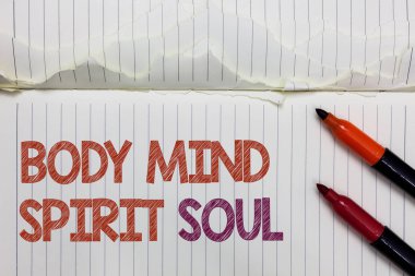 Text sign showing Body Mind Spirit Soul. Conceptual photo Personal Balance Therapy Conciousness state of mind White torn page written some letters beside laid two red marker. clipart