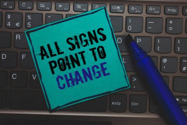Text sign showing All Signs Point To Change. Conceptual photo Necessity of doing things differently new vision Huge button with computer keyboard black lined written blue page marker pen. clipart