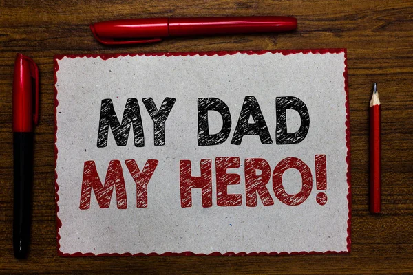 Text sign showing My Dad My Hero. Conceptual photo Admiration for your father love feelings emotions compliment Red bordered white page centered some texts wooden desk pen pencil. — Stock Photo, Image