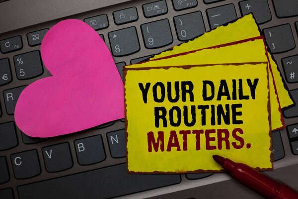 Writing note showing Your Daily Routine Matters. Business photo showcasing Have good habits to live a healthy life Red bordered yellow written paper pinch with love on computer keybaord.