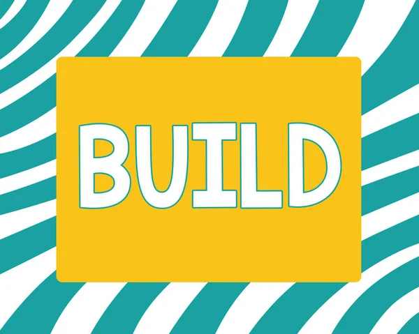 Writing note showing Build. Business photo showcasing Construct something by putting material together over a period of time — Stock Photo, Image