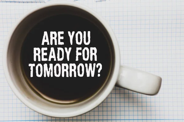 Writing note showing Are You Ready For Tomorrow question. Business photo showcasing Preparation to the future Motivation Coffee mug with black coffee floating some white texts on white paper. — Stock Photo, Image