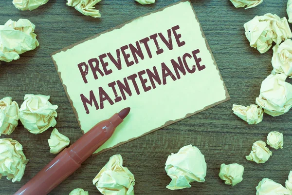 Handwriting text Preventive Maintenance. Concept meaning Avoid Breakdown done while machine still working