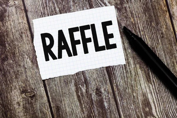 Text sign showing Raffle. Conceptual photo means of raising money by selling numbered tickets offer as prize — Stock Photo, Image