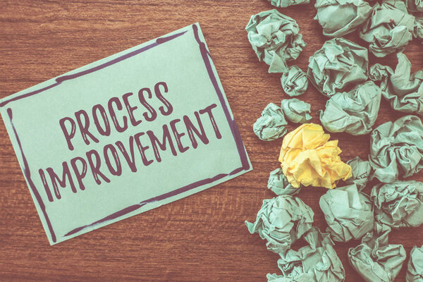 Handwriting text writing Process Improvement. Concept meaning Optimization Meet New Quotas Standard of Quality