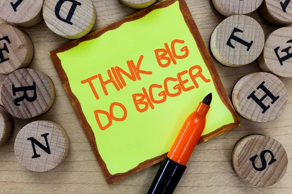 Word writing text Think Big Do Bigger. Business concept for Raise the Bar and Aim far Higher than the Usual