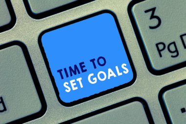 Kavramsal el zaman için Set gol gösterilen yazma. İş fotoğraf metin istenilen amaç gelecekte başarmak istedim