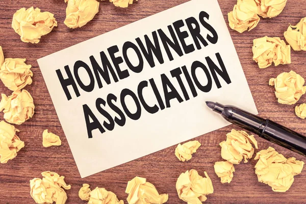 Conceptual hand writing showing Homeowners Association. Business photo showcasing Organization with fee for upkeeps of Gated Community