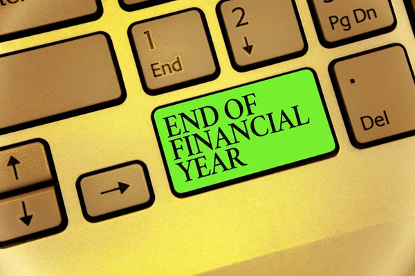 Writing note showing End Of Financial Year. Business photo showcasing Revise and edit accounting sheets from previous year Keyboard button symbol typing job computer use learn program software.