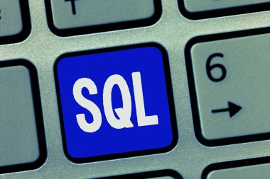 İlişkisel veritabanı yönetimi için bir standart bilgisayar dili SQL. kavramsal gösterilen metin işaret fotoğraf