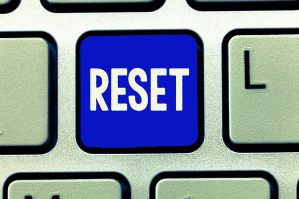 Writing note showing Reset. Business photo showcasing cause device return to its factory mode Set again zero start point — Stock Photo, Image