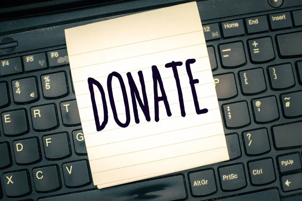 Escrever nota mostrando Doar. Foto de negócios mostrando dar dinheiro ou bens para uma boa causa, por exemplo, a caridade ou as pessoas — Fotografia de Stock