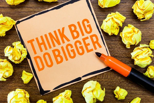 Writing note showing Think Big Do Bigger. Business photo showcasing Raise the Bar and Aim far Higher than the Usual