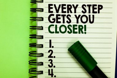 Handwriting text Every Step Gets You Closer. Concept meaning Keep moving to reach your goals objectives Written letters and numbers on notepad laid green marker green back. clipart