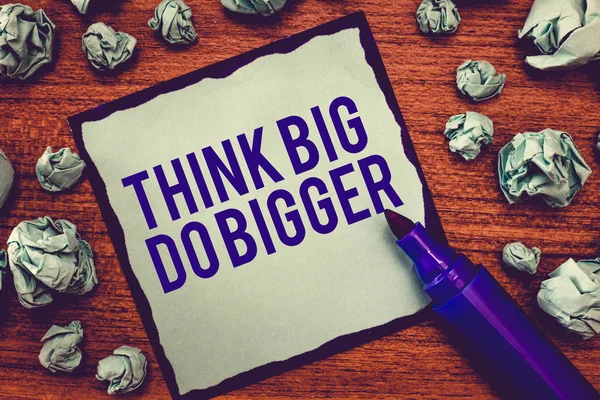 Writing note showing Think Big Do Bigger. Business photo showcasing Raise the Bar and Aim far Higher than the Usual