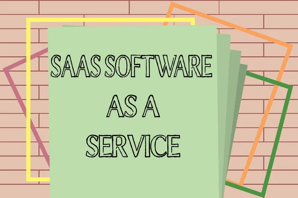 Χειρόγραφο κείμενο γράφοντας Saas Software As A Service. Έννοια που σημαίνει ότι η χρήση του cloud βάση App μέσω του Διαδικτύου — Φωτογραφία Αρχείου