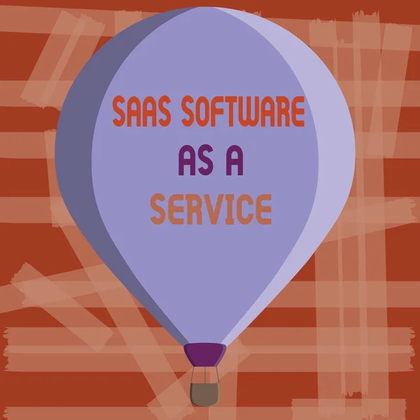 Σύνταξη σημείωσης δείχνει Saas Software As A Service. Επαγγελματίες φωτογραφία προβάλλοντας τη χρήση του cloud με βάση εφαρμογής μέσω του Διαδικτύου — Φωτογραφία Αρχείου