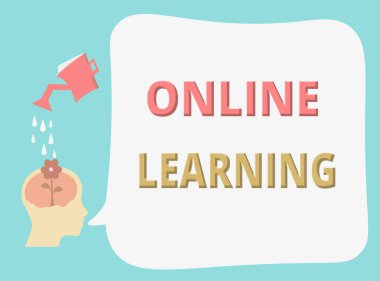 Online Learning 'i gösteren bir not yazıyorum. Larning 'in internet ve bilgisayarın yardımıyla çekilmiş bir iş fotoğrafı.